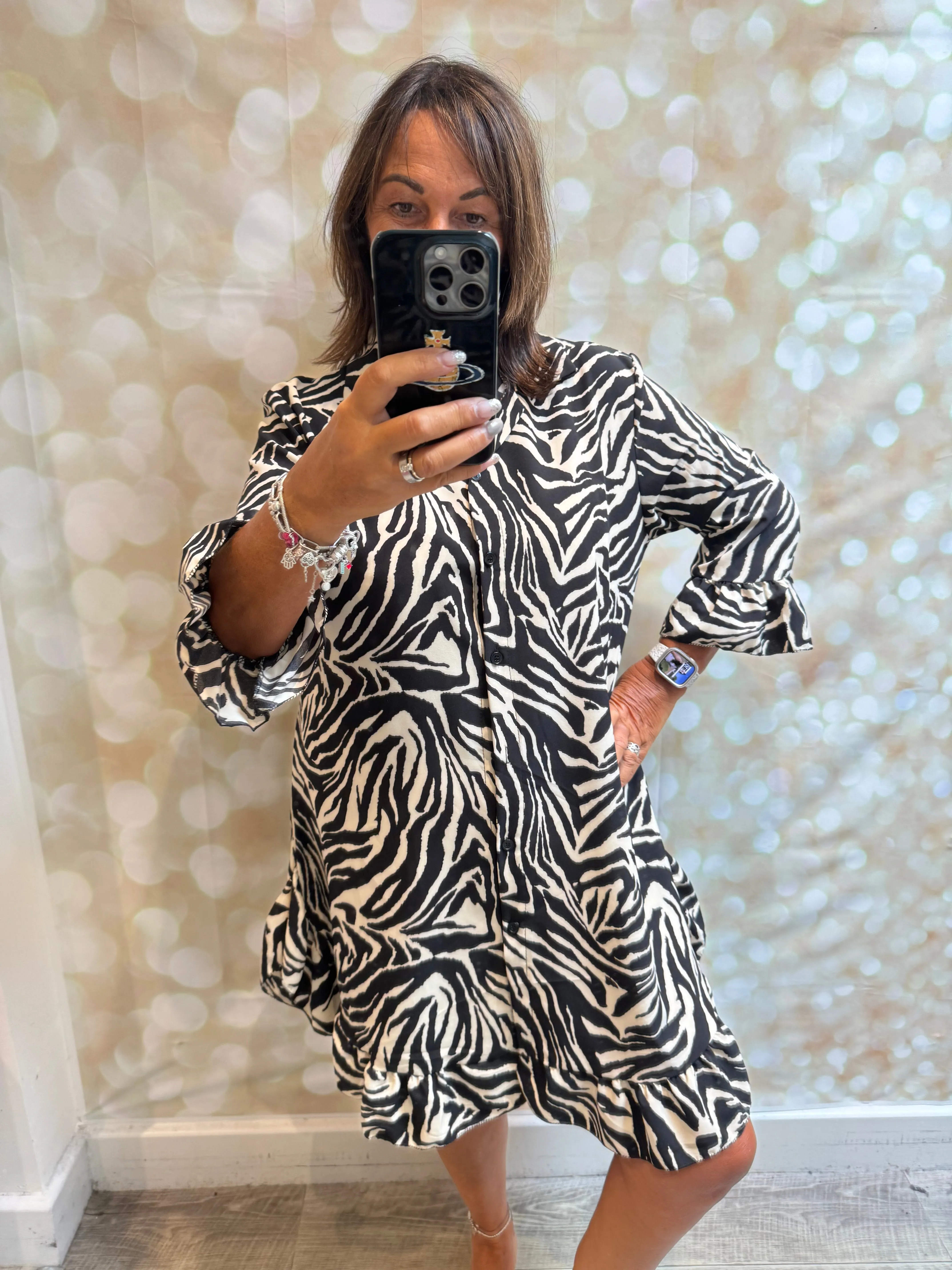 Animal print dress with frill hem