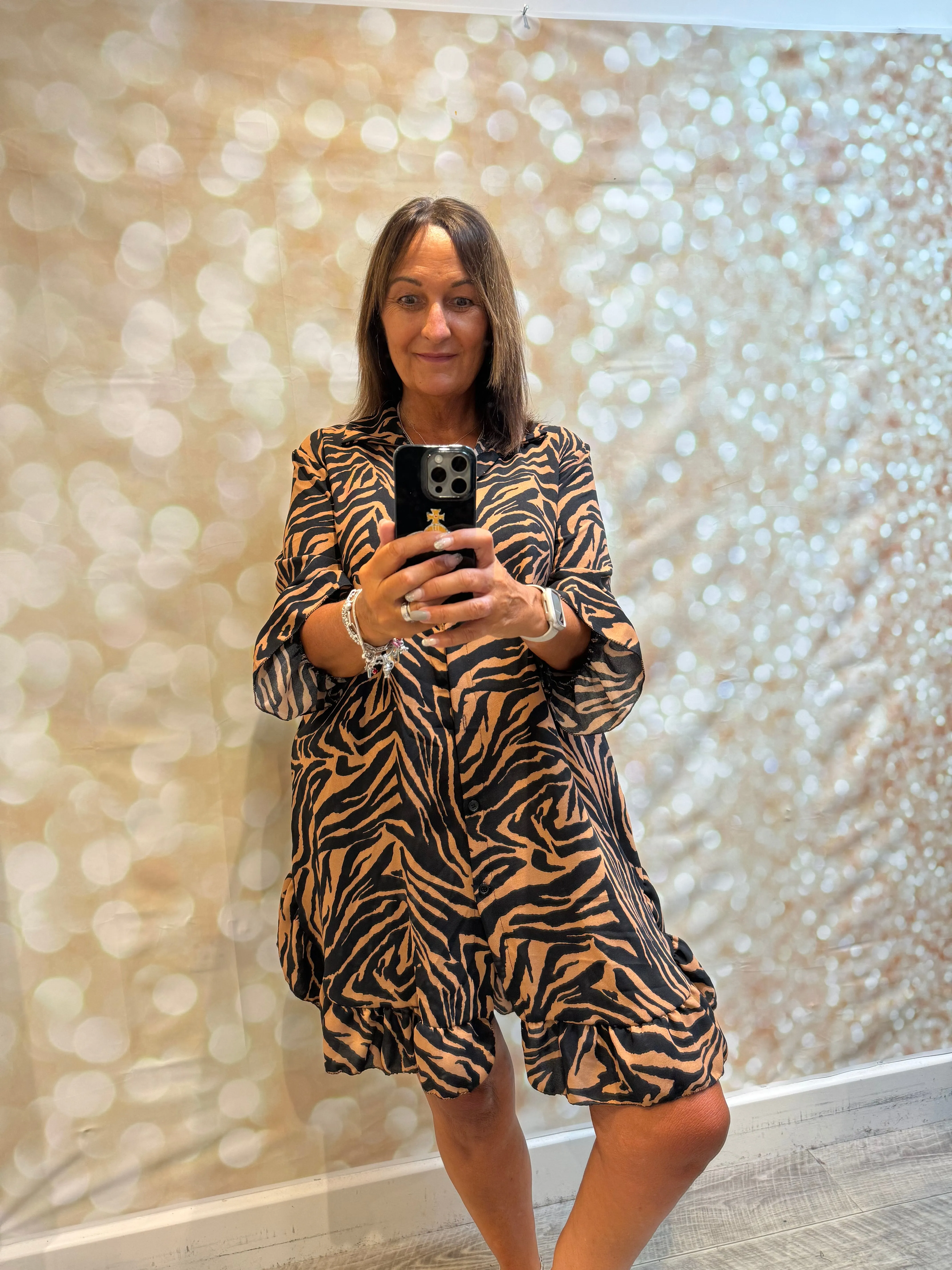 Animal print dress with frill hem